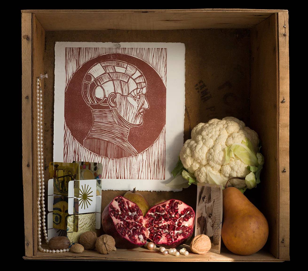 tableau of objects that represent the brain including cauliflower